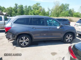 2016 Honda Pilot EX-L with VIN 5FNYF6H54GB083139, listed as a IAAI auction lot 42150923 with 213,009 mi miles and . Bid and sale history available at DreamBid. Image 14.