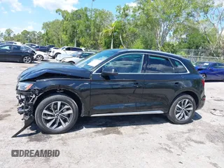 2023 Audi Q5 S line Premium Plus z VIN WA1EAAFY6P2168594, wystawiony jako IAAI lot #41863196 z przebiegiem 16 310 mil mil oraz . Historia ofert i sprzedaży dostępna na DreamBid. Obrazek 14.