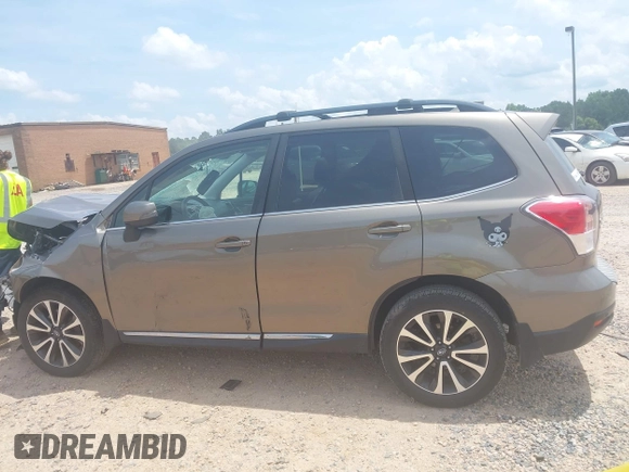 2017 Subaru Forester Touring with VIN JF2SJGWCXHH558789, listed as a IAAI auction lot 42518698 with 112,294 mi miles and . Bid and sale history available at DreamBid. Image 14.