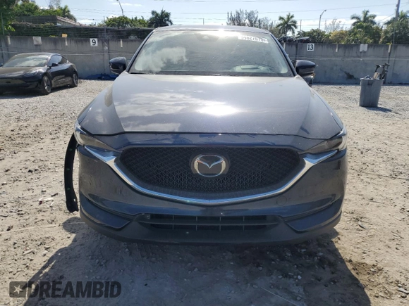 2021 Mazda CX-5 Grand Touring with VIN JM3KFBDM4M1462570, listed as a Copart auction lot 54827675 with 45,389 mi miles and Salvage Title. Bid and sale history available at DreamBid. Image 5.