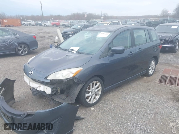 2012 Mazda 5 Touring с VIN JM1CW2CL7C0101862, выставлен на аукционе IAAI как лот 41883483 с пробегом 176 966 миль миль и . История ставок и продаж доступна на DreamBid. Изображение 2.