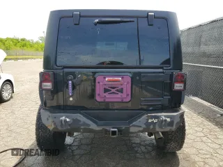 2012 Jeep Wrangler Unlimited Sahara with VIN 1C4BJWEG4CL120370, listed as a Copart auction lot 58744135 with 166,455 mi miles and Clean title. Bid and sale history available at DreamBid. Image 6.