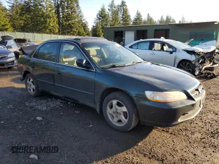 2000 Honda Accord EX z VIN JHMCG5659YC033886, wystawiony jako Copart lot #87952845 z przebiegiem 317 730 mil mil oraz Szkoda całkowita • Salvage title. Historia ofert i sprzedaży dostępna na DreamBid. Obrazek 4.