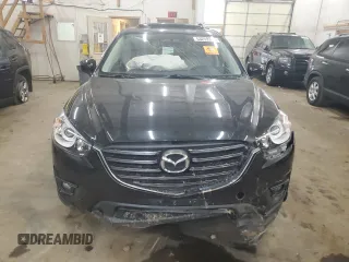 2016 Mazda CX-5 Grand Touring with VIN JM3KE4DY0G0854568, listed as a Copart auction lot 53259345 with 74,264 mi miles and Salvage Title. Bid and sale history available at carsss.com. Image 5.