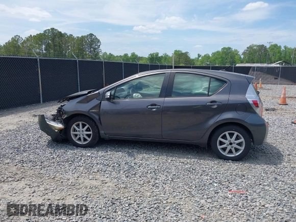 2014 Toyota Prius One with VIN JTDKDTB39E1070331, listed as a IAAI auction lot 42086348 with 219,028 mi miles and . Bid and sale history available at DreamBid. Image 14.