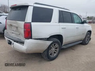 2015 Chevrolet Tahoe LS with VIN 1GNSCAEC2FR641252, listed as a IAAI auction lot 41528667 with 183,796 mi miles and . Bid and sale history available at DreamBid. Image 4.