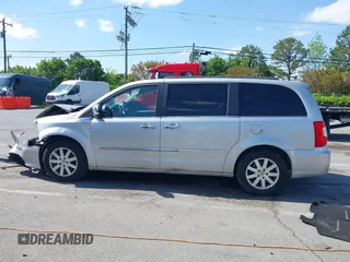 2012 Chrysler Town & Country Touring L with VIN 2C4RC1CG1CR245008, listed as a IAAI auction lot 41951680 with 98,656 mi miles and . Bid and sale history available at DreamBid. Image 14.