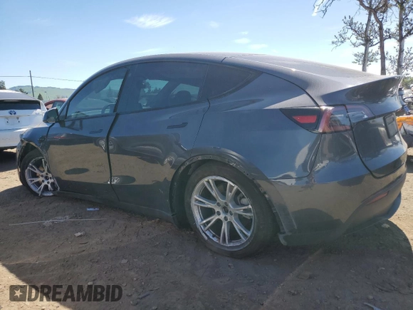 2022 Tesla Model Y Long Range with VIN 7SAYGDEE2NF402320, listed as a Copart auction lot 50396605 with 27,426 mi miles and Salvage Title. Bid and sale history available at DreamBid. Image 2.