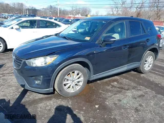 2016 Mazda CX-5 Touring with VIN JM3KE4CY6G0717393, listed as a IAAI auction lot 41596084 with 150,774 mi miles. Bid and sale history available at carsss.com. Image 19.