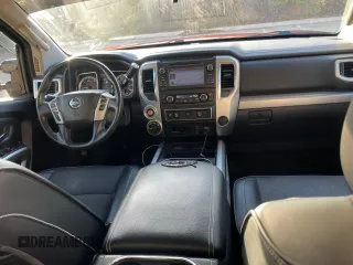 2016 Nissan Titan XD PRO-4X with VIN 1N6BA1F40GN516889, listed as a Copart auction lot 81415354 with 124,664 mi miles and Clean Title. Bid and sale history available at carsss.com. Image 9.
