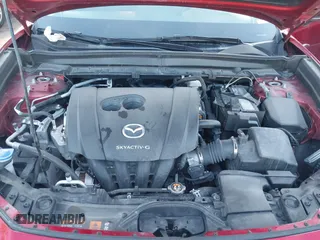 2022 Mazda CX-30 S Carbon Edition с VIN 3MVDMBCL4NM431242, выставлен на аукционе IAAI как лот 41851636 с пробегом 40 982 миль миль и . История ставок и продаж доступна на DreamBid. Изображение 10.