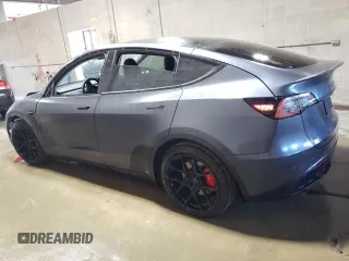 2021 Tesla Model Y Performance with VIN 5YJYGDEF2MF134700, listed as a Copart auction lot 56325685 with 66,730 mi miles and Salvage Title. Bid and sale history available at DreamBid. Image 2.