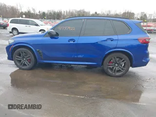 2022 BMW X5 M z VIN 5YMJU0C03N9M51891, wystawiony jako IAAI lot #41737922 z przebiegiem 35 725 mil mil oraz . Historia ofert i sprzedaży dostępna na DreamBid. Obrazek 13.
