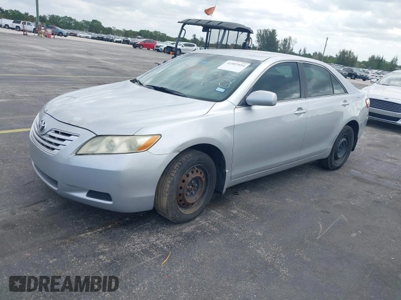 2007 Toyota Camry CE with VIN 4T1BE46K97U621990, listed as a IAAI auction lot 41907054 with 136,067 mi miles. Bid and sale history available at carsss.com. Image 2.