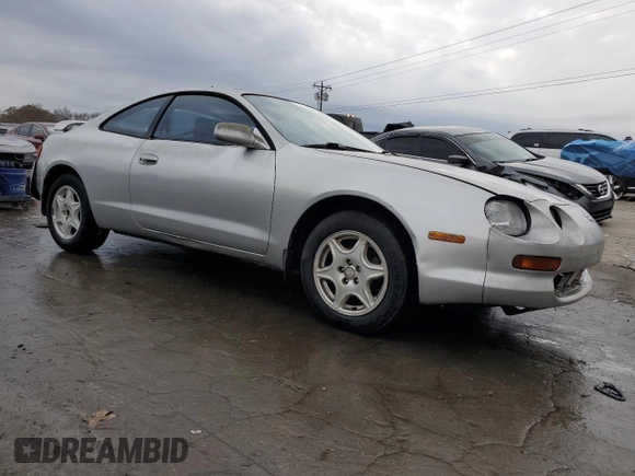 1995 Toyota Celica ST with VIN JT2AT00N3S0042469, listed as a Copart auction lot 82116834 with 269,778 mi miles and Salvage Title. Bid and sale history available at carsss.com. Image 4.