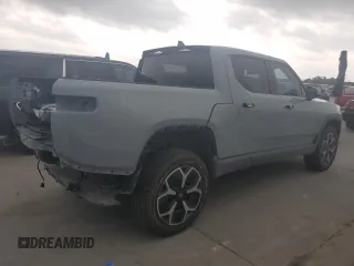 2022 Rivian R1T Adventure z VIN 7FCTGAAA0NN014488, wystawiony jako Copart lot #51024514 z przebiegiem 18 721 mil mil oraz Szkody całkowita. Historia ofert i sprzedaży dostępna na DreamBid. Obrazek 3.