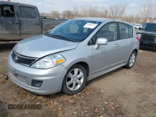 2012 Nissan Versa S with VIN 3N1BC1CP2CK272290, listed as a IAAI auction lot 42030626 with 136,000 mi miles. Bid and sale history available at carsss.com. Image 2.