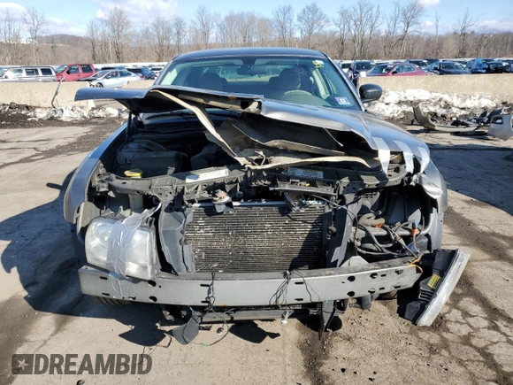 2009 Chrysler 300 LX with VIN 2C3KA43D79H554807, listed as a Copart auction lot 46872625 with 139,843 mi miles and Salvage Title. Bid and sale history available at carsss.com. Image 5.