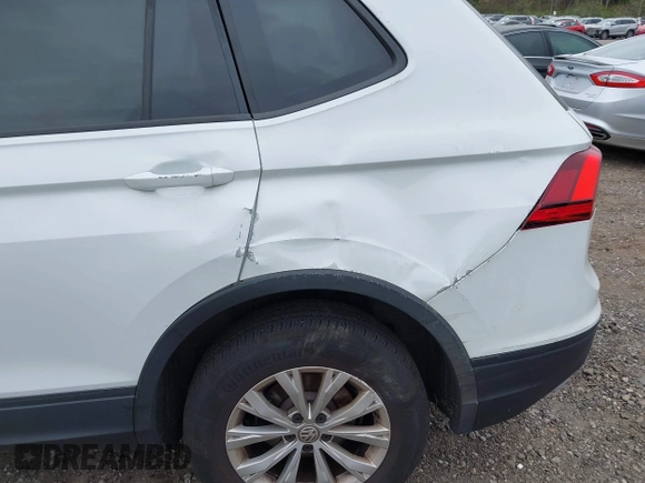2019 Volkswagen Tiguan S z VIN 3VV0B7AX9KM055305, wystawiony jako IAAI lot #42160128 z przebiegiem 67 826 mil mil oraz . Historia ofert i sprzedaży dostępna na DreamBid. Obrazek 18.