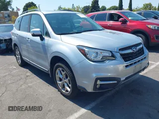 2017 Subaru Forester Touring z VIN JF2SJAWC3HH432206, wystawiony jako IAAI lot #42743530 z przebiegiem 50 207 mil mil oraz . Historia ofert i sprzedaży dostępna na DreamBid. Obrazek 1.