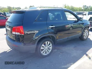 2011 Kia Sorento EX with VIN 5XYKUDA27BG053442, listed as a IAAI auction lot 42062265 with 120,996 mi miles. Bid and sale history available at carsss.com. Image 4.