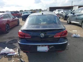 2013 Volkswagen CC Sport z VIN WVWBP7AN3DE570204, wystawiony jako IAAI lot #41478044 z przebiegiem 168 376 mil mil oraz . Historia ofert i sprzedaży dostępna na DreamBid. Obrazek 16.