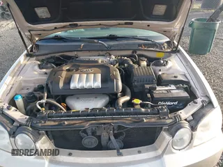 2004 Kia Optima LX z VIN KNAGD126045302372, wystawiony jako IAAI lot #41022315 z przebiegiem 199 588 mil mil oraz . Historia ofert i sprzedaży dostępna na DreamBid. Obrazek 10.
