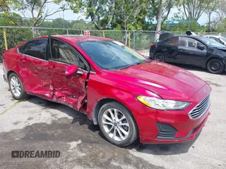 2020 Ford Fusion SE z VIN 3FA6P0HD5LR164755, wystawiony jako IAAI lot #42092028 z przebiegiem 96 959 mil mil oraz . Historia ofert i sprzedaży dostępna na DreamBid. Obrazek 1.