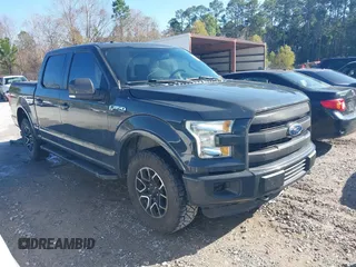 2016 Ford F-150 XLT with VIN 1FTEW1EF2GKE21353, listed as a IAAI auction lot 41209744 with 104,198 mi miles. Bid and sale history available at carsss.com. Image 1.