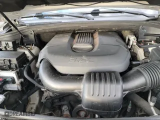 2011 Jeep Grand Cherokee Laredo with VIN 1J4RR4GG1BC669834, listed as a IAAI auction lot 42019804 with 173,943 mi miles. Bid and sale history available at carsss.com. Image 9.