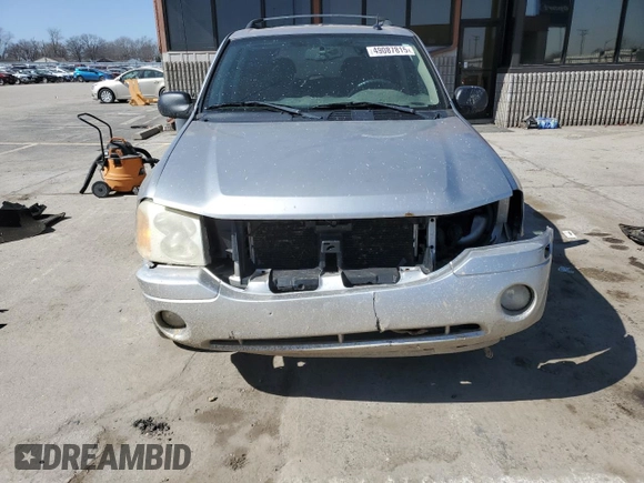 2005 GMC Envoy SLE with VIN 1GKDT13S652171203, listed as a Copart auction lot 49087815 with 292,815 mi miles and Salvage Title. Bid and sale history available at carsss.com. Image 5.