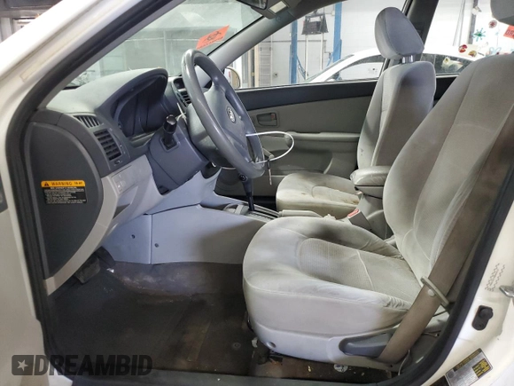 2009 Kia Spectra EX with VIN KNAFE221495654137, listed as a Copart auction lot 55777665 with 187,453 mi miles and Clean Title. Bid and sale history available at DreamBid. Image 7.