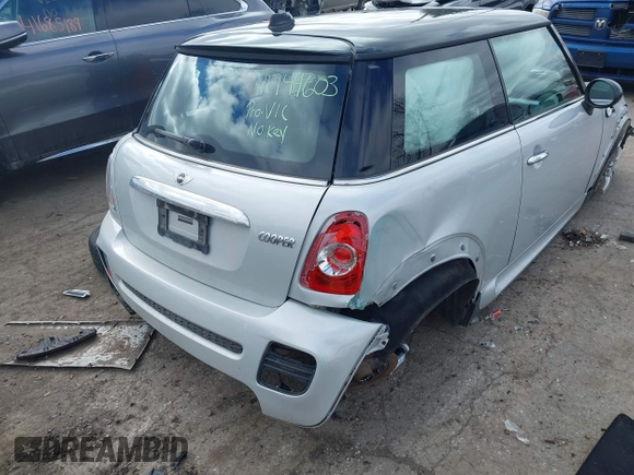 2013 MINI Cooper Hardtop with VIN WMWSU3C56DT374488, listed as a IAAI auction lot 41744603 with 82,678 mi miles. Bid and sale history available at carsss.com. Image 4.