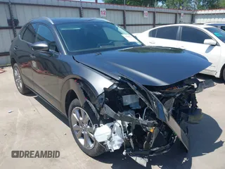 2022 Mazda CX-30 S Premium with VIN 3MVDMBDL5NM416649, listed as a IAAI auction lot 41990745 with 13,923 mi miles and . Bid and sale history available at DreamBid. Image 1.