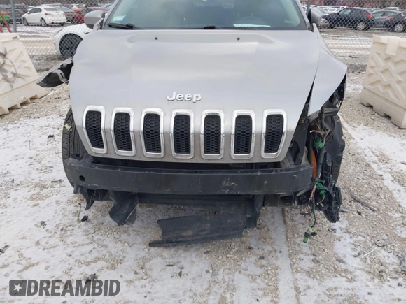 2016 Jeep Cherokee 75th Anniversary with VIN 1C4PJLCB1GW297555, listed as a IAAI auction lot 41232269 with 257,033 mi miles. Bid and sale history available at carsss.com. Image 6.