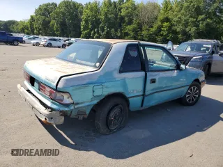 1992 Plymouth Sundance z VIN 1P3XP24D7NN120553, wystawiony jako Copart lot #68472794 z przebiegiem 148 535 mil mil oraz Szkody całkowita. Historia ofert i sprzedaży dostępna na DreamBid. Obrazek 3.