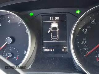 2016 Volkswagen Passat SE z VIN 1VWBS7A34GC066383, wystawiony jako IAAI lot #41723442 z przebiegiem 104 077 mil mil oraz . Historia ofert i sprzedaży dostępna na DreamBid. Obrazek 14.