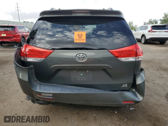 2014 Toyota Sienna LE with VIN 5TDJK3DC4ES085384, listed as a Copart auction lot 60375125 with 81,696 mi miles and Salvage title. Bid and sale history available at DreamBid. Image 6.