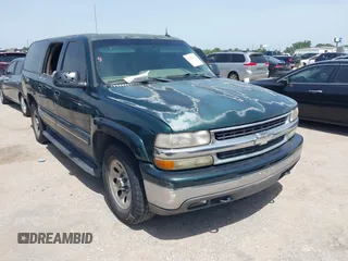 2002 Chevrolet Suburban LT z VIN 1GNEC16Z52J330522, wystawiony jako IAAI lot #42251636 z przebiegiem 292 936 mil mil oraz . Historia ofert i sprzedaży dostępna na DreamBid. Obrazek 1.