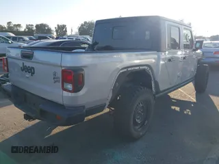 2022 Jeep Gladiator Willys with VIN 1C6HJTAG4NL132558, listed as a IAAI auction lot 41626851 with 28,251 mi miles and . Bid and sale history available at DreamBid. Image 4.