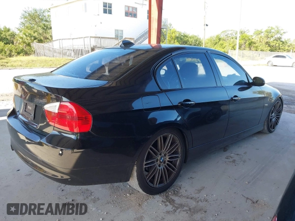 2008 BMW 3 Series 328i with VIN WBAVA37598NL45805, listed as a IAAI auction lot 42002424 with 206,402 mi miles. Bid and sale history available at carsss.com. Image 4.