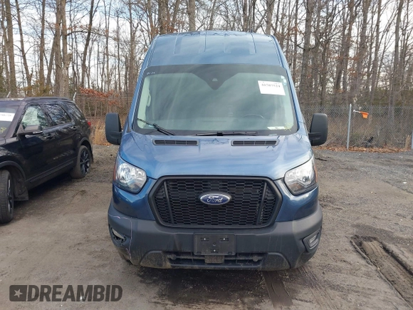 2023 Ford Transit Cargo z VIN 1FTBR3X86PKA19968, wystawiony jako IAAI lot #41587524 z przebiegiem 44 987 mil mil oraz . Historia ofert i sprzedaży dostępna na DreamBid. Obrazek 12.