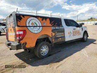 2022 Ford F-150 XL z VIN 1FTFX1E86NKD22373, wystawiony jako Copart lot #69963114 z przebiegiem 96 983 mil mil oraz Szkoda całkowita • Salvage title. Historia ofert i sprzedaży dostępna na DreamBid. Obrazek 3.