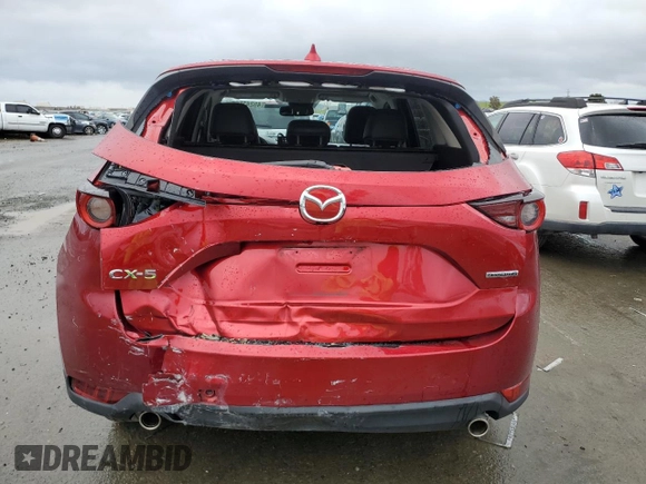 2021 Mazda CX-5 Touring with VIN JM3KFACM8M0406987, listed as a Copart auction lot 45241535 with 57,673 mi miles and Salvage Title. Bid and sale history available at carsss.com. Image 6.