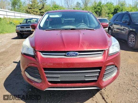 2016 Ford Escape SE z VIN 1FMCU9GX1GUA52213, wystawiony jako Copart lot #57137545 z przebiegiem 142 646 mil mil oraz Czysty tytuł • Clean title. Historia ofert i sprzedaży dostępna na DreamBid. Obrazek 5.