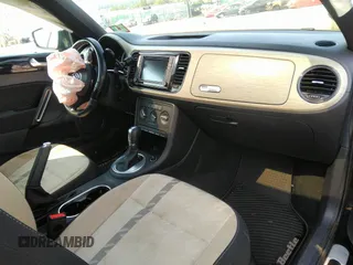 2018 Volkswagen Beetle S z VIN 3VWFD7ATXJM705321, wystawiony jako IAAI lot #40118047 z przebiegiem Nie podano mil oraz . Historia ofert i sprzedaży dostępna na DreamBid. Obrazek 5.