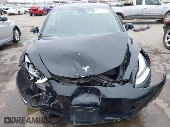 2018 Tesla Model 3 Long Range Battery with VIN 5YJ3E1EB3JF090567, listed as a IAAI auction lot 41568312 with 35,327 mi miles and . Bid and sale history available at DreamBid. Image 13.