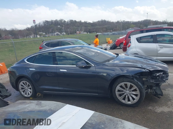 2016 Tesla Model S 70 with VIN 5YJSA1E14GF157118, listed as a IAAI auction lot 41794381 with 53,651 mi miles and . Bid and sale history available at DreamBid. Image 14.