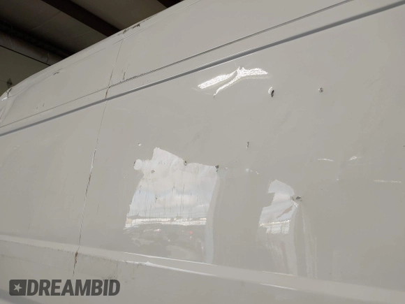 2022 Ram ProMaster Cargo with VIN 3C6MRVHG4NE114319, listed as a IAAI auction lot 41944344 with 21,896 mi miles and . Bid and sale history available at DreamBid. Image 21.