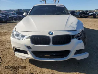 2012 BMW 3 Series 335i with VIN WBA3A9C59CF270736, listed as a Copart auction lot 87223824 with 124,700 mi miles and Salvage title. Bid and sale history available at DreamBid. Image 5.